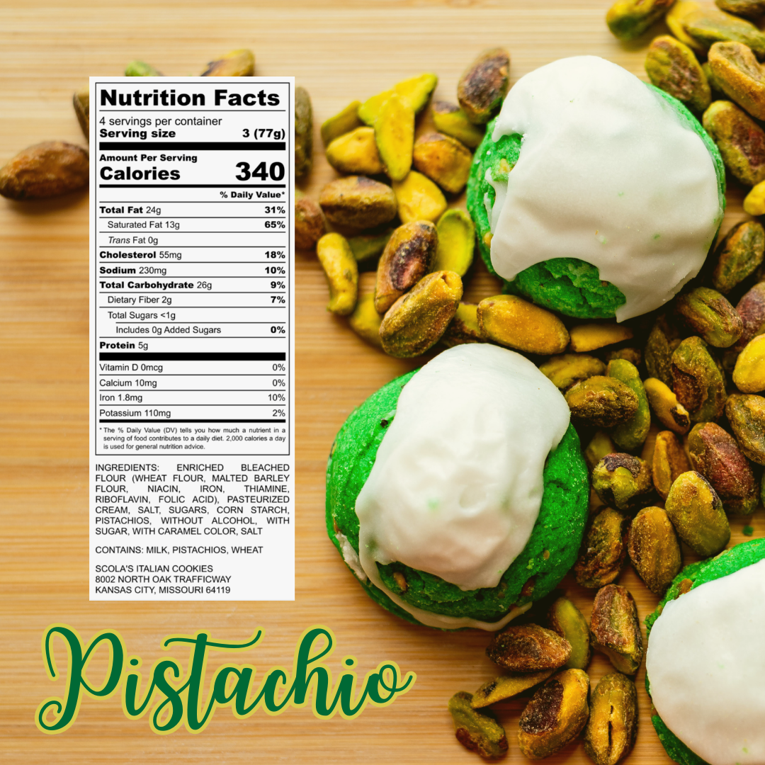 Green pistachio cookies dipped in white icing surrounded by pistachios, with nutrition label on the side.